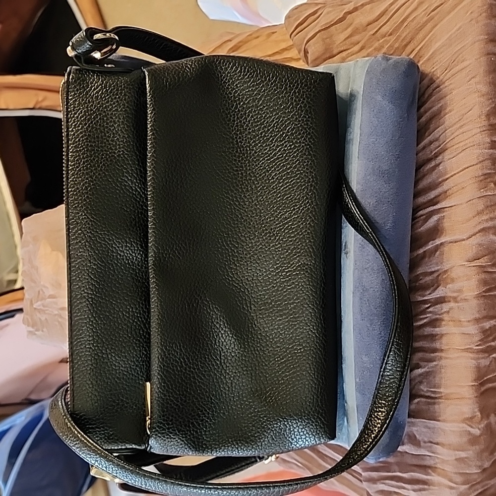 Black purse with 24 inch strap. A New Day from target.
